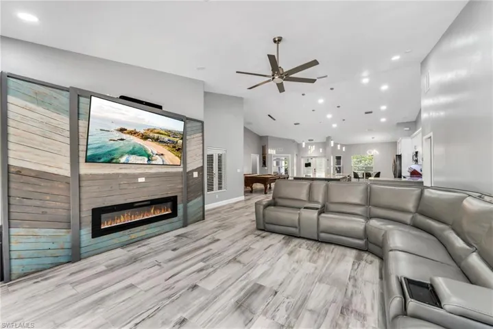 Living room with electric fireplace feature wall