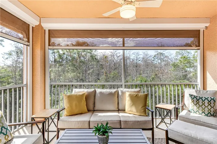 Watch the sunset from this private screened balcony with Storm Smart Shades