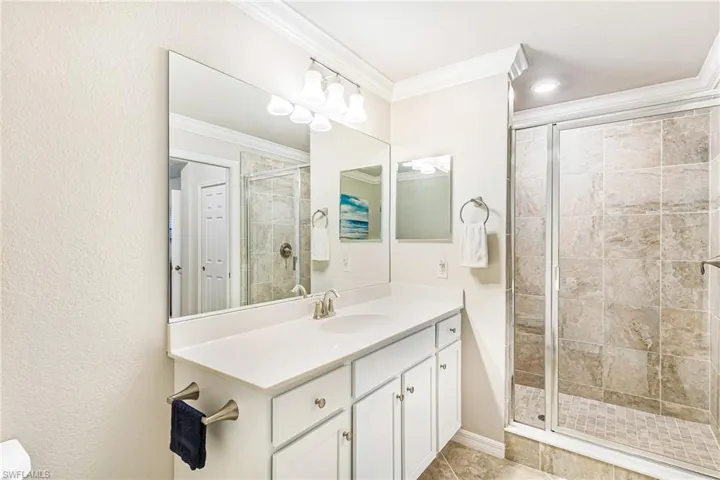 Primary with dual sinks and large walk in shower