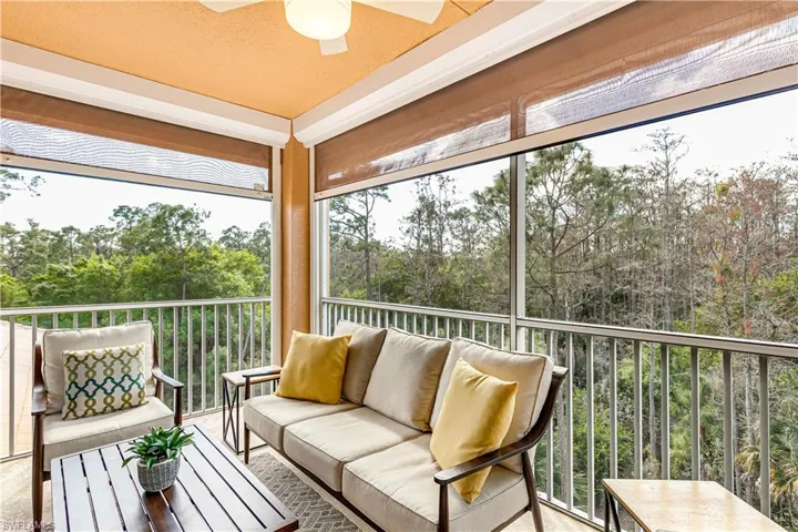 Watch the sunset from this private screened balcony with Storm Smart Shades