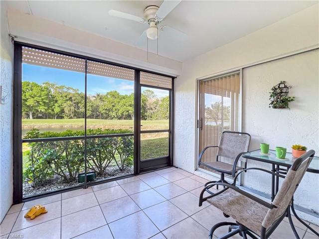View of the back yard, lake, golf course, and the nature preserve from your lanai