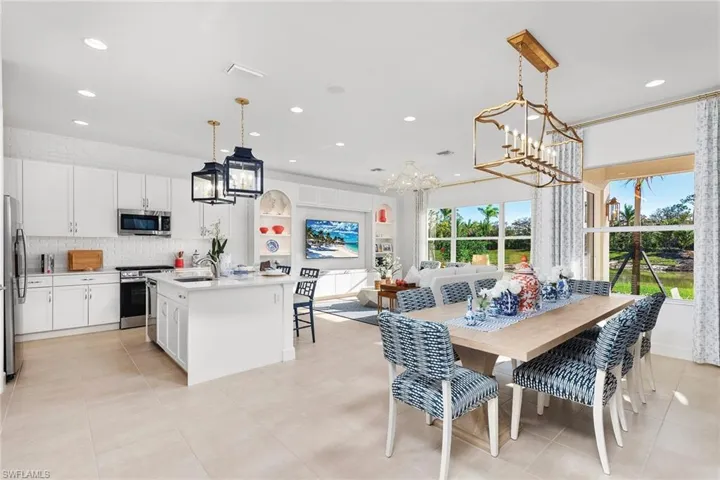 Dining space featuring visible vents, recessed lighting, a chandelier, and light tile patterned floors