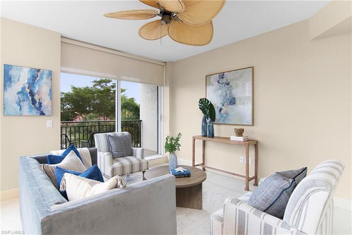Den-Open to kitchen and adjacent to sunrise balcony