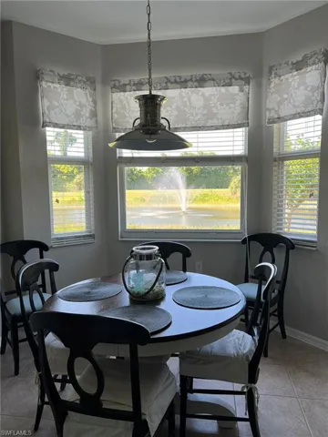 Dining space featuring tile floors