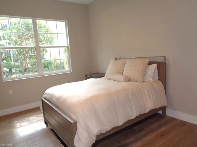 Bedroom featuring wood finished floors