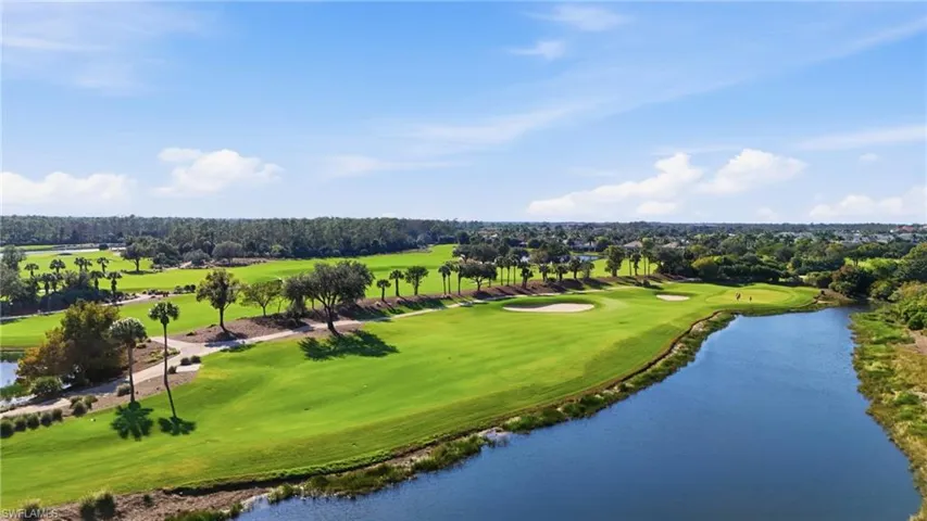 Bird's eye view of a local golf course and a nearby body of water