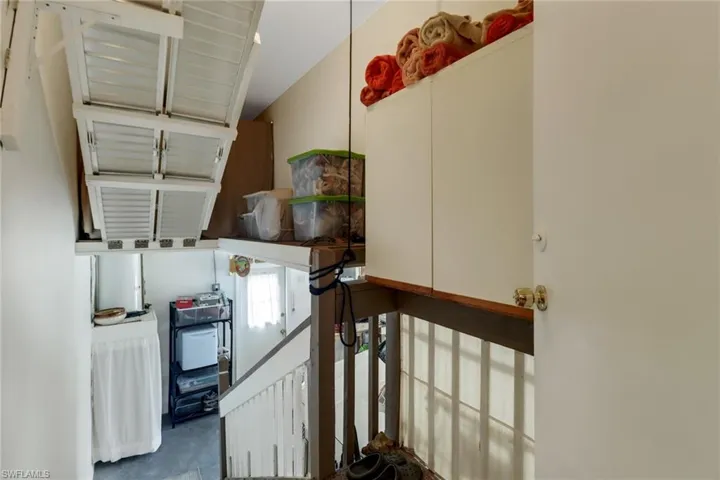 Stairway drop to additional storage.
