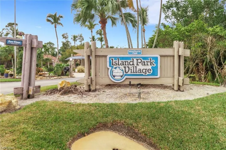 Community sign with a lawn