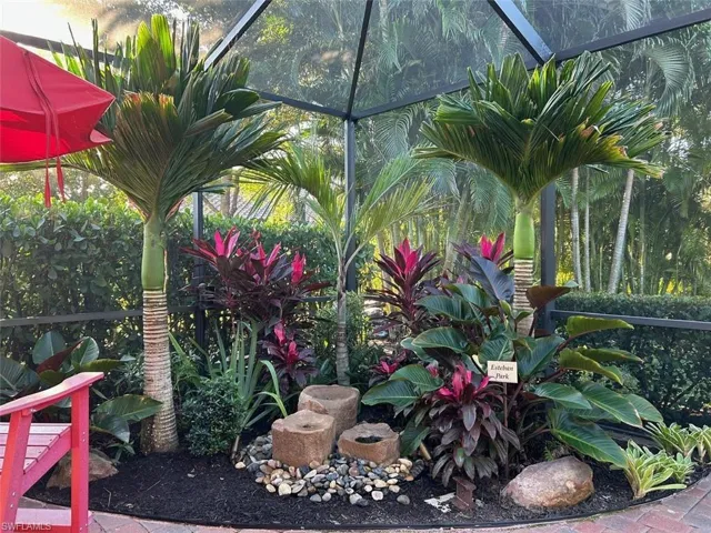 View of yard featuring a lanai