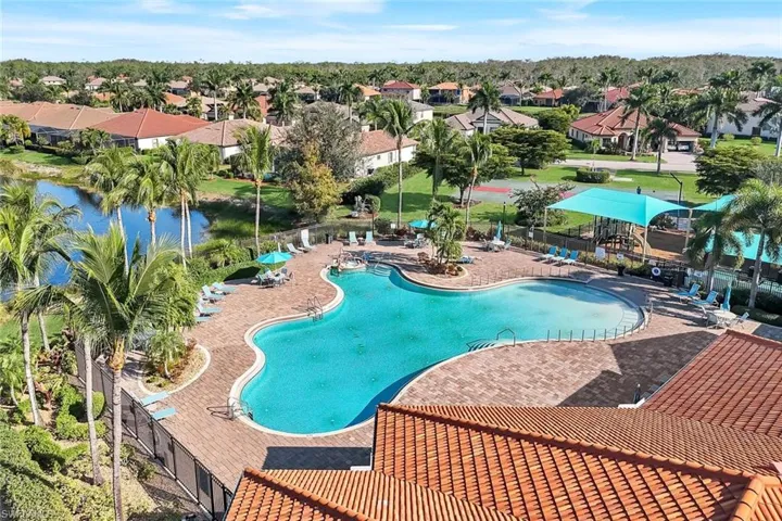 Community pool featuring a residential view and a patio