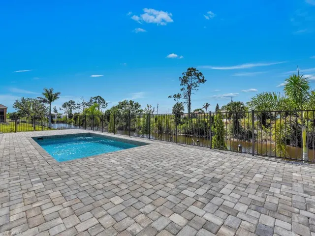 View of pool with fence, a patio, and a fenced in pool
