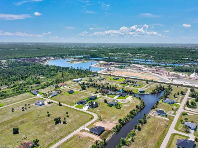 Bird's eye view featuring a water view and a residential view