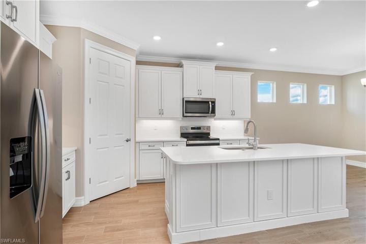 Quartz Counter with White Cabinetry