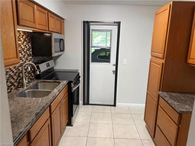 Granite Counters and Tile Backsplash