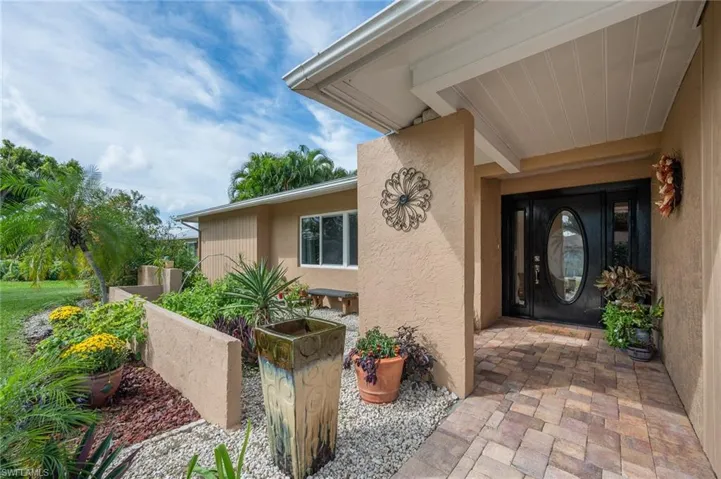 Welcome to this updated home with covered front patio.