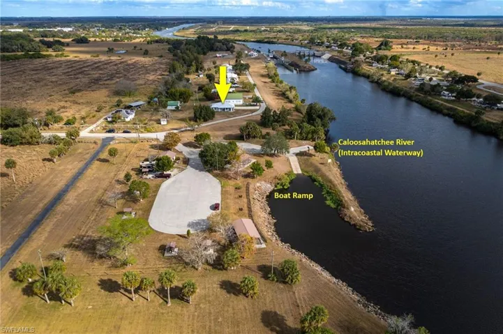 View of property location with a large body of water