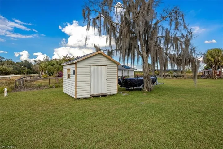 View of yard with a shed