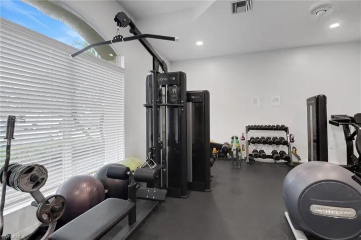 Workout room with recessed lighting