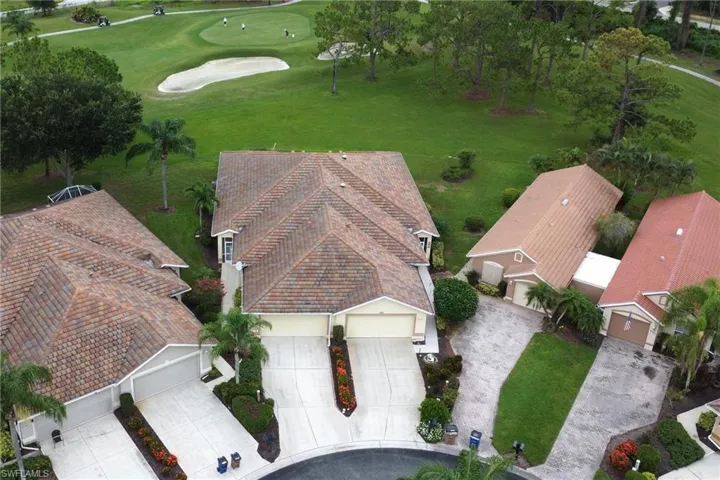 View from above of property with a golf course