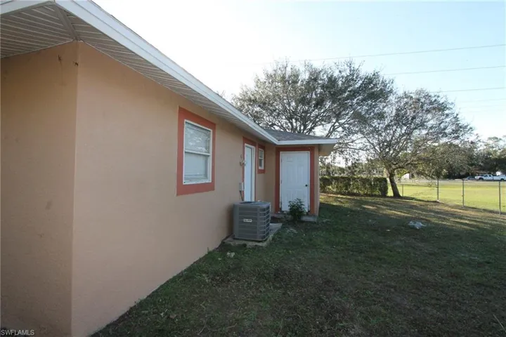 View of yard with central AC unit