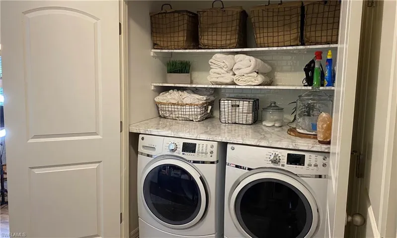 Laundry area featuring washing machine and dryer