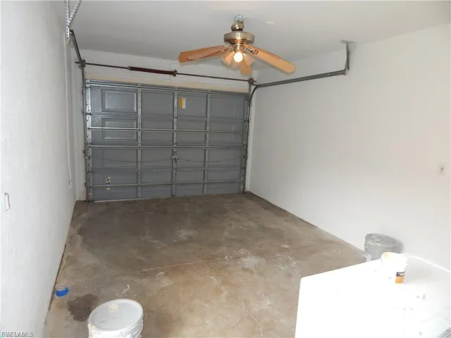 Garage featuring ceiling fan