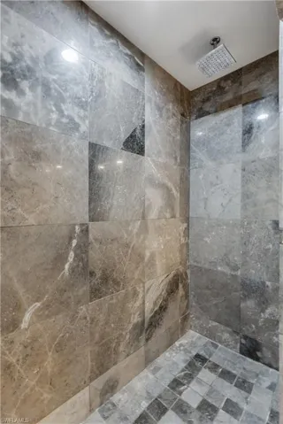 Bathroom with tiled shower