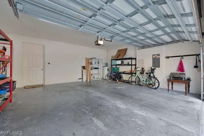 Garage featuring electric panel
