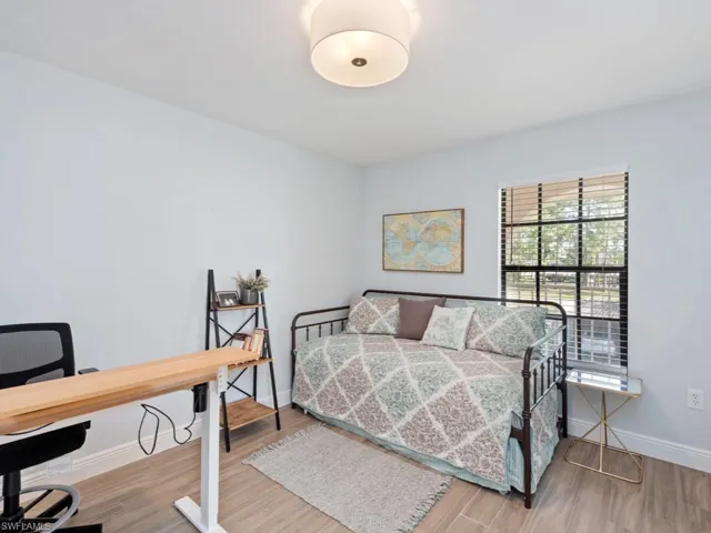 Bedroom featuring hardwood / wood-style flooring