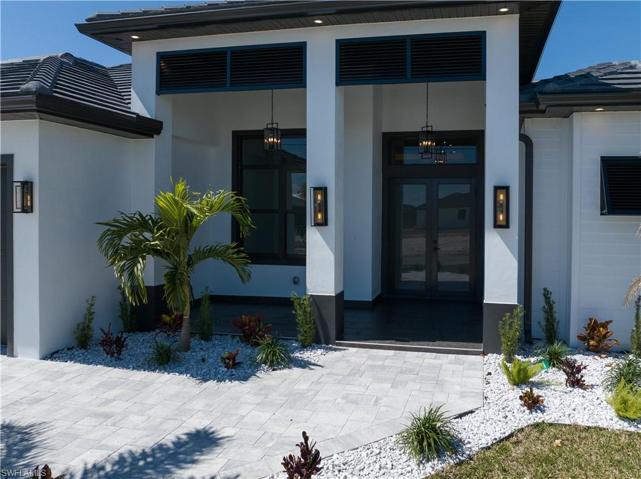 Luxury Contemporary Home with Decorative Bahamas Shutters & Unique Designer's Lamps