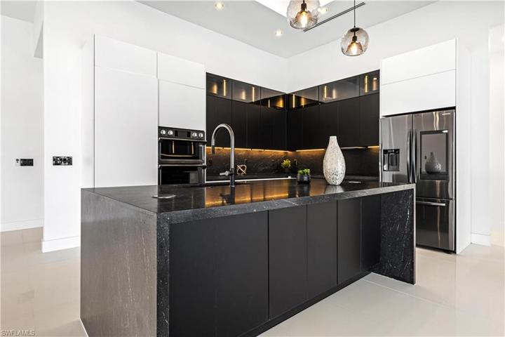 Kitchen - Quartz Countertops, Stainless Steel SAMSUNG Wall Oven, Microwave & Smart Refrigerator with Wi-Fi & Big Screen