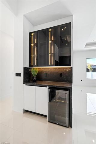 Bar & Coffee Station with Custom Cabinetry with LED Track Lights & Wine Cooler