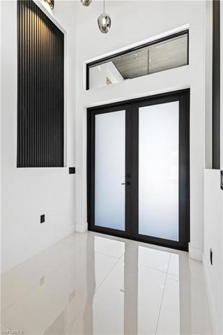 Double Front Doors Impact Resistant with Frosted Glass & Keyless Pad and Foyer with Designer's Lamp