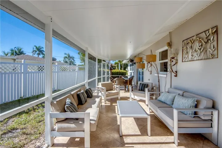 Sunroom / solarium with an outdoor hangout area and a patio area