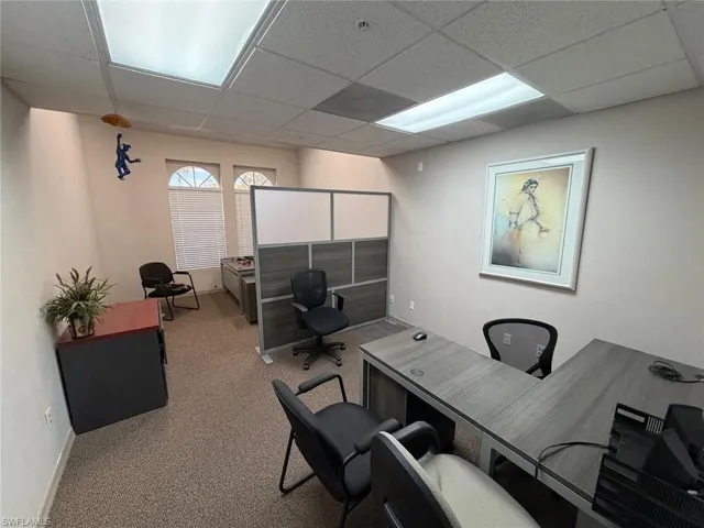 Office space featuring a drop ceiling