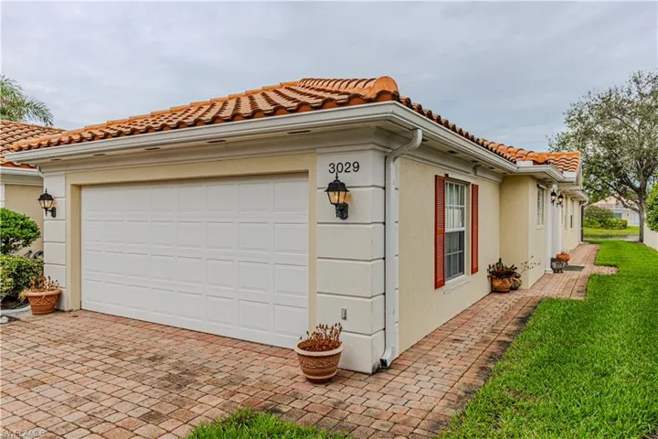 View of home's exterior with a garage