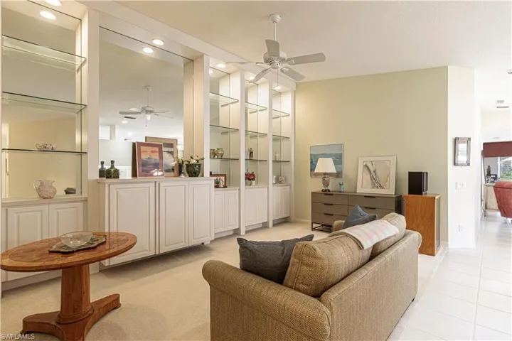 Tiled living room with ceiling fan