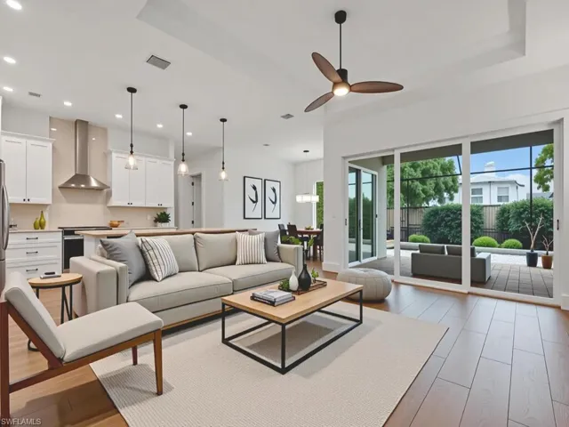 Living area featuring light wood-type flooring, recessed lighting, and ceiling fan