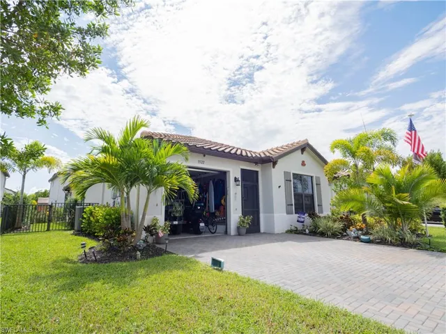 Mediterranean / spanish-style house featuring a front yard
