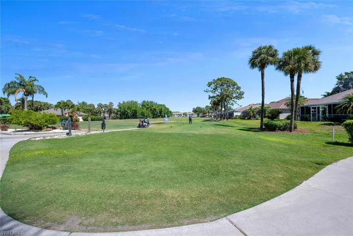 View of community featuring a lawn