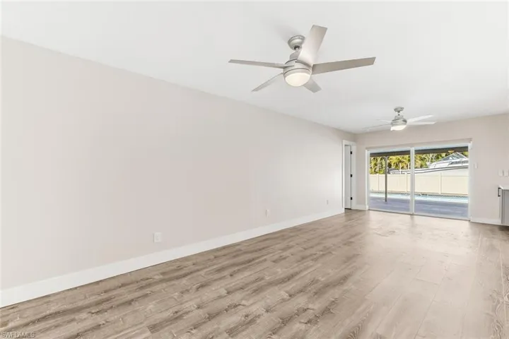 Living/Dining Area with Primary Suite to the Left