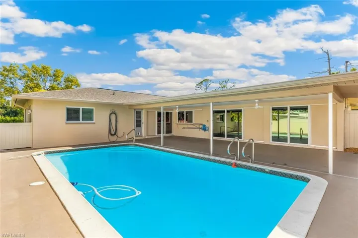 Impact Windows/Doors with Pool Access from Multiple Rooms