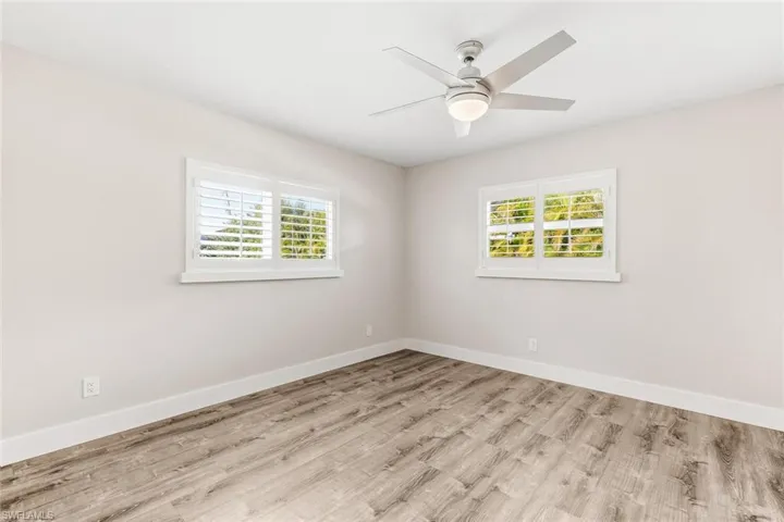 Guest Bedroom 2 ~ Plantation Shutters/Impact Glass