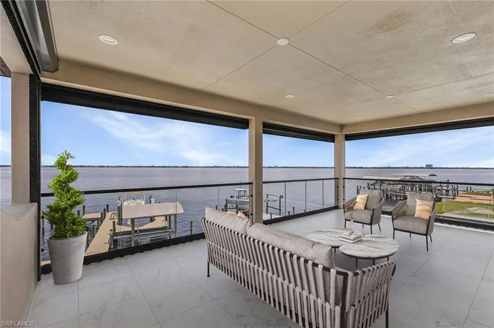 View of patio / terrace featuring a water view and outdoor lounge area