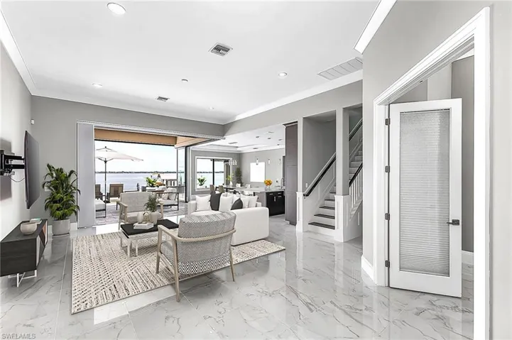 Living room with ornamental molding