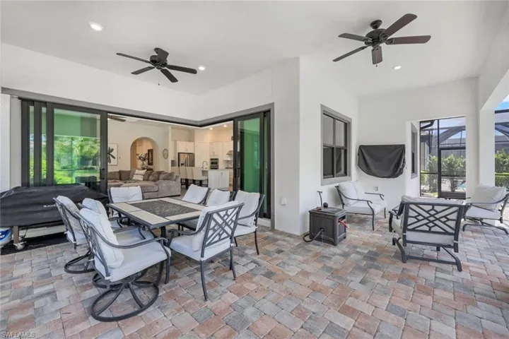 View of patio / terrace with ceiling fan and an outdoor hangout area