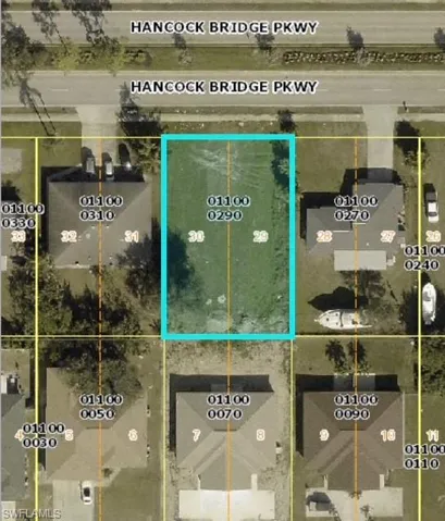 Aerial view of property's location featuring property parcel outlined