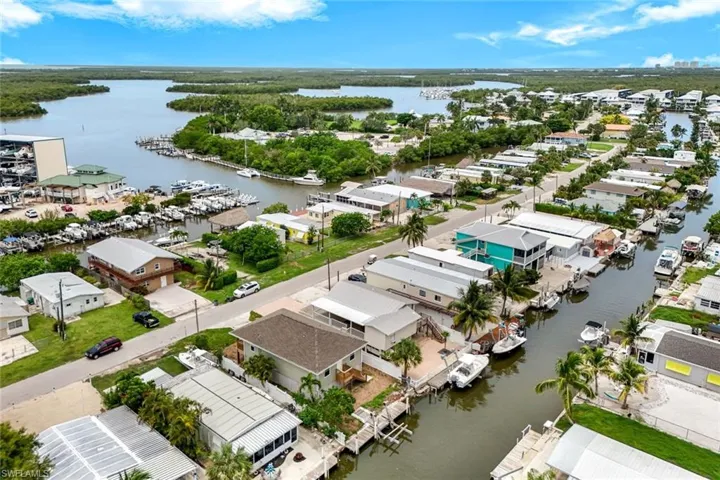 Aerial view of residential area with a nearby body of water