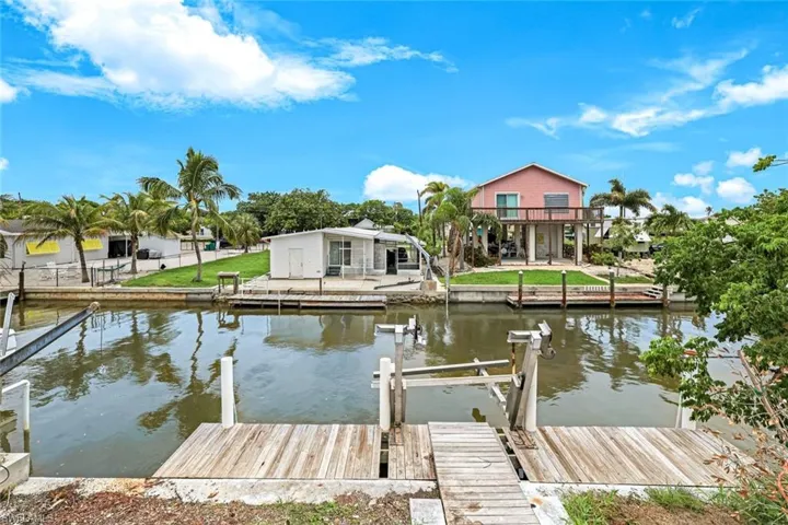 Dock with a water view and boat lift
