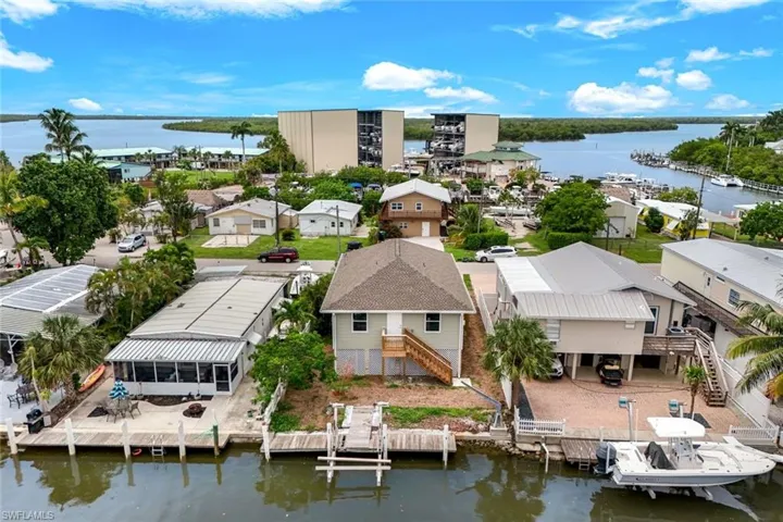 View from above of property with a large body of water
